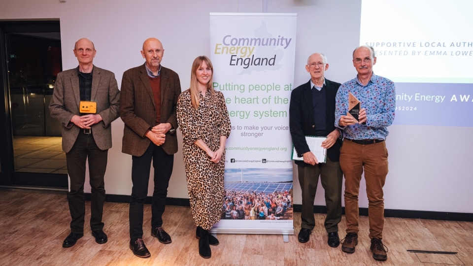 Five employees at CHEESE Project with their Community Energy Award, November 2024