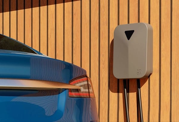 VOQA Electric Vehicle (EV) Charger on a wall and the boot of a Tesla EV