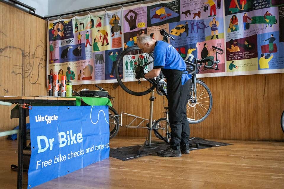 Life Cycle's 'Dr Bike' stand with bike mechanic